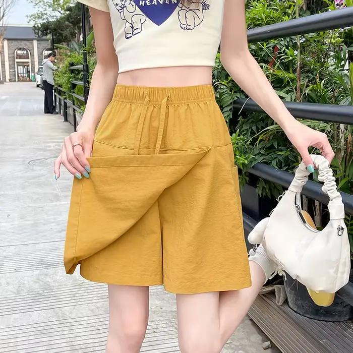 Faux 2 pièces Shorts jupes pour femmes taille haute Mini jupe blanche pantalon solide a-ligne fente latérale légère jupes d'été coréennes