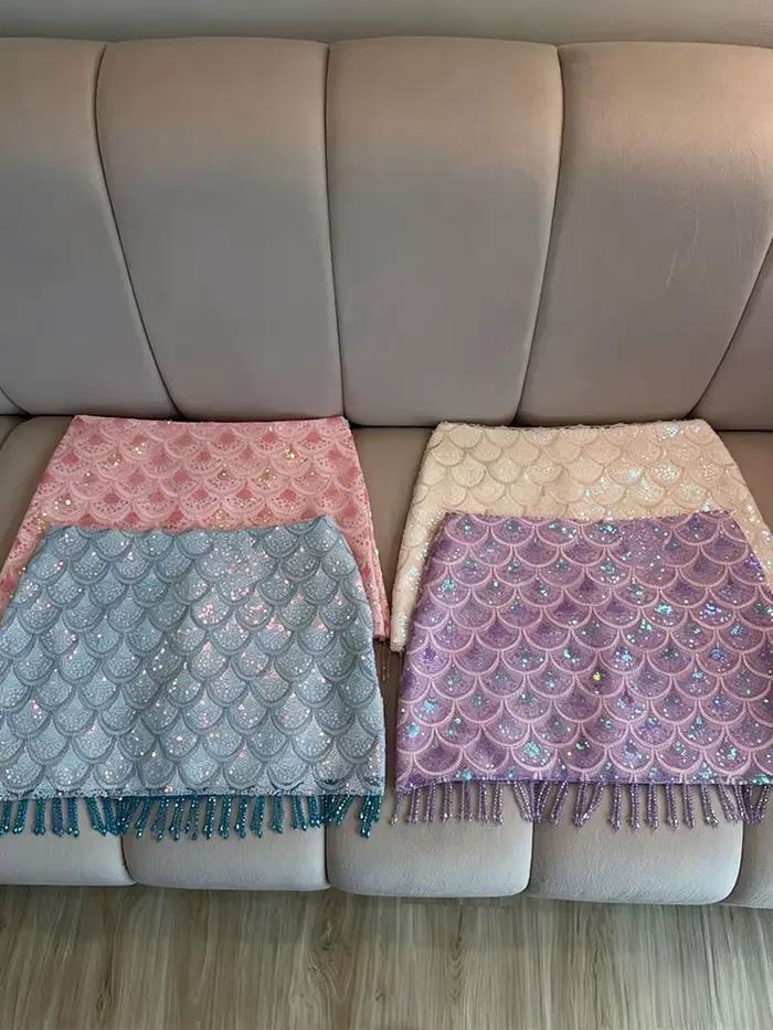 Mini-jupe sexy à sequins pour femme, coupe ajustée, ourlet à franges, taille haute, style bodycon, nouvelle collection été 2026, tenue de plage brillante pour les vacances