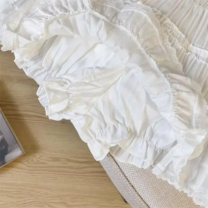 Mode coréenne taille élastique jupes plissées femmes été couleur unie dentelle Mini jupe femme douce une ligne Shorts