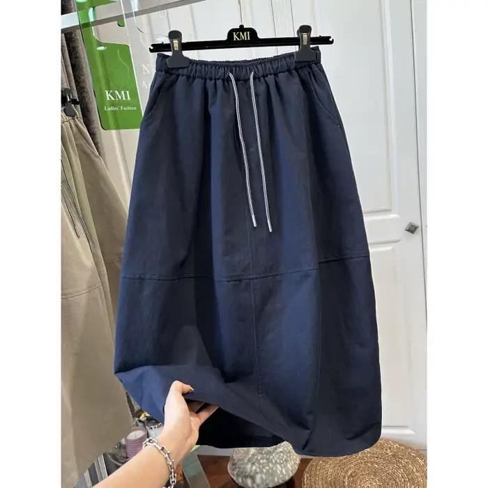 Jupe parapluie mi-longue élégante et polyvalente à taille élastique pour femme