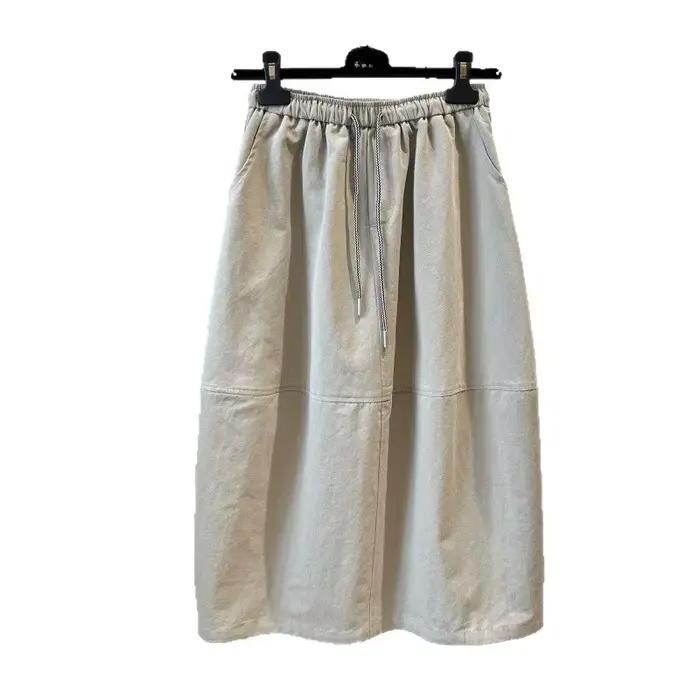 Jupe parapluie mi-longue élégante et polyvalente à taille élastique pour femme