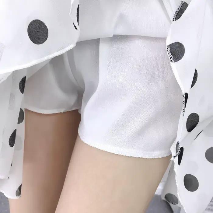 Mini jupe trapèze en mousseline de soie à pois blancs pour femmes