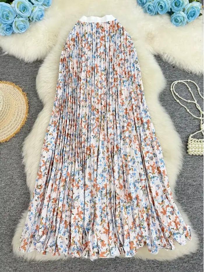 Nouvelle jupe plissée à imprimé floral pour femme, style vacances d'été 2026, élégante et polyvalente, jupe longue