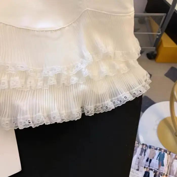 Jupe trapèze en dentelle à volants