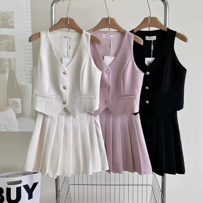 Ensembles de jupes pour femmes 2026 Nouveauté été Gilet sans manches et jupe plissée taille haute 2 pièces Tenue élégante jupe midi pour femme