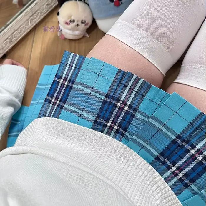 Jupes plissées à carreaux pour filles