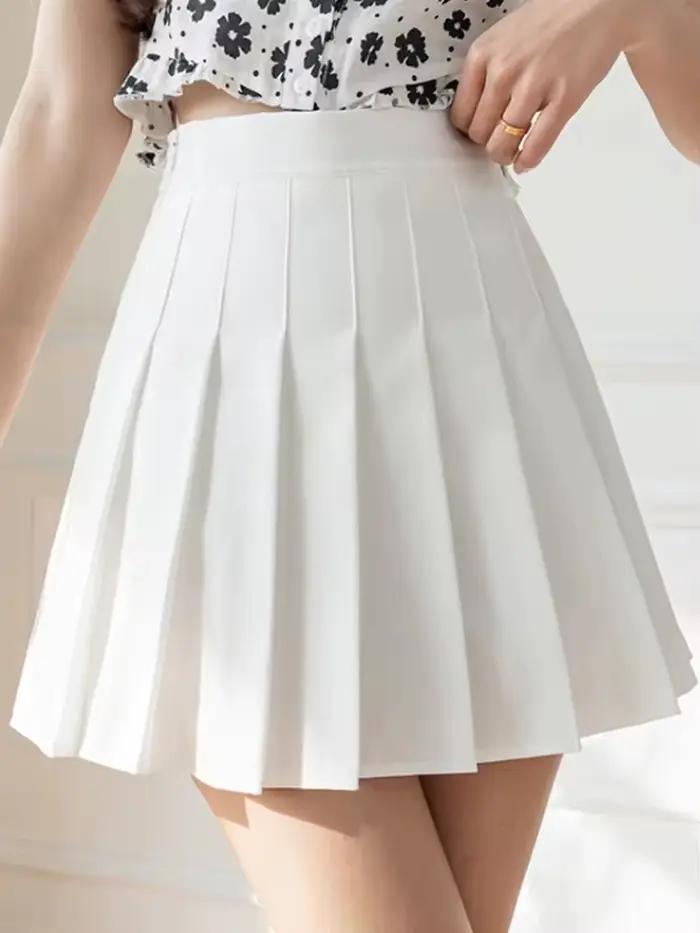Jupes plissées blanches pour femmes