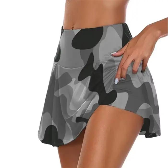 Jupe sportive féminine polyester plissée avec patchs travaillés pour danseurs et pratiquants de fitness