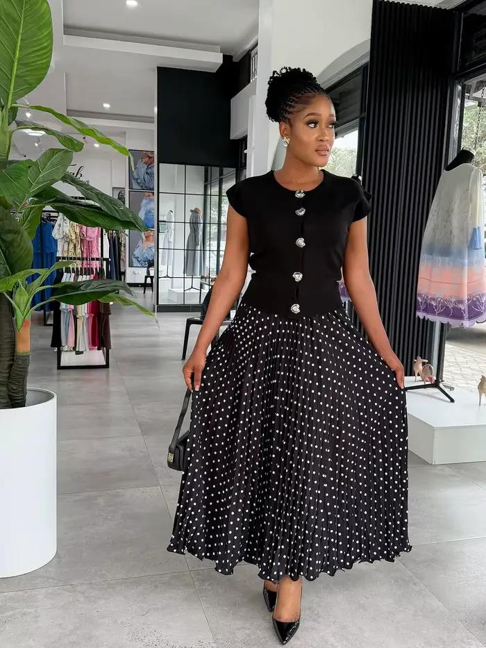 Jupe midi plissée élégante à pois unis pour femme