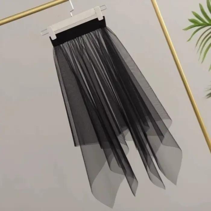 Jupe longue transparente en dentelle et tulle