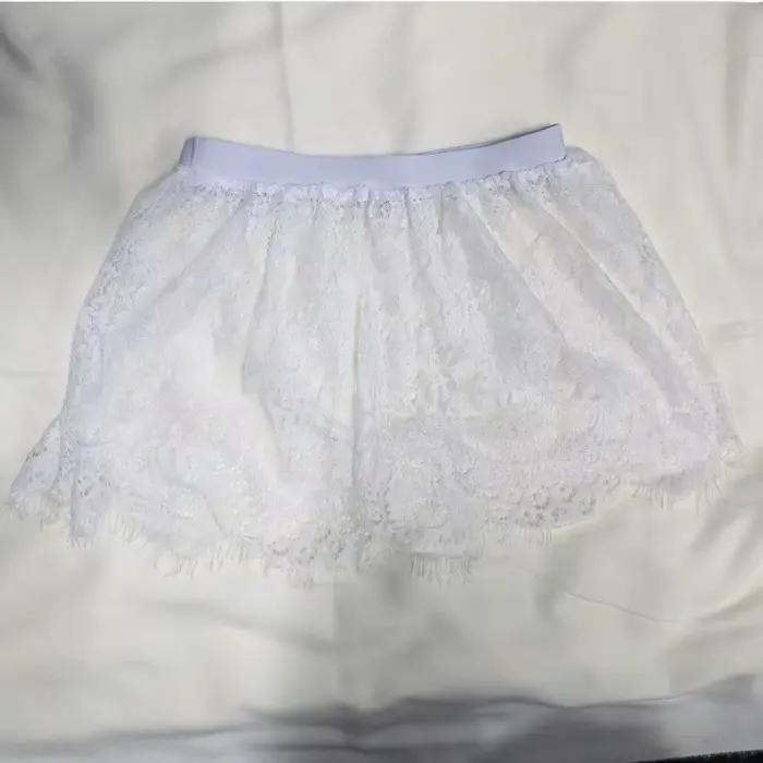 Mini-jupe sexy transparente en dentelle et maille