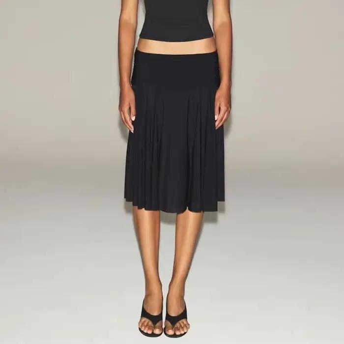 Jupe plissée taille moyenne pour femmes, tenue élégante, couleur unie, mi-longue, douce et romantique, au-dessus du genou, printemps-automne
