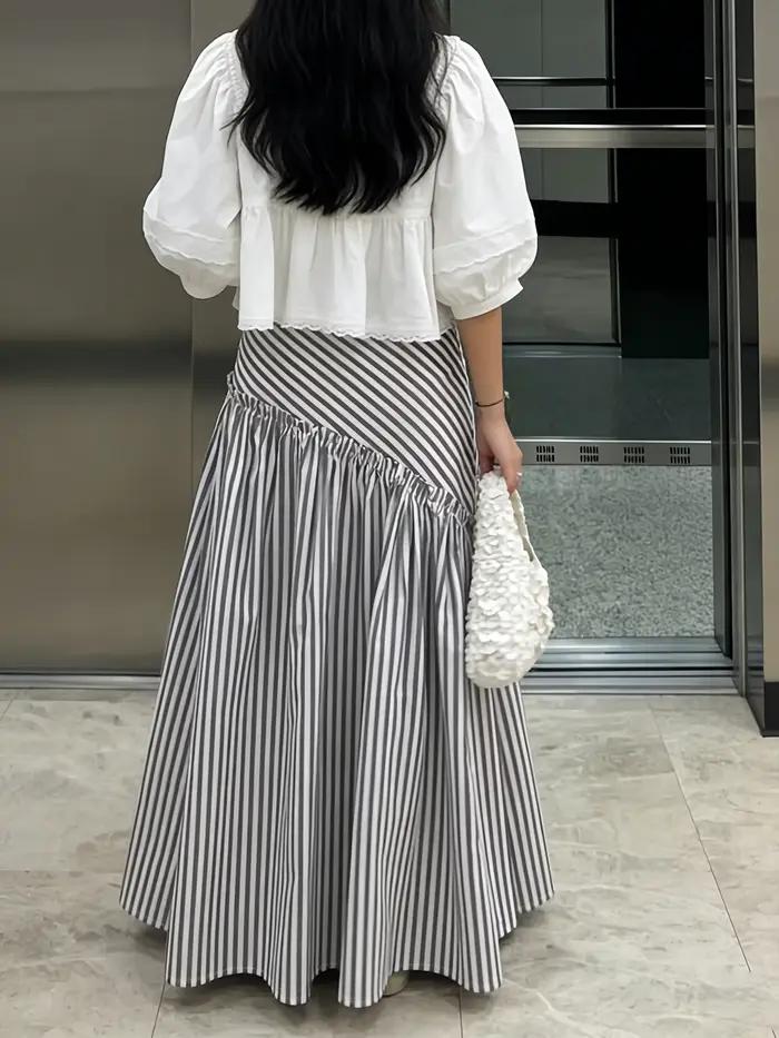 Jupe longue asymétrique à taille haute, plissée, à rayures vintage de style français. Design unique pour les trajets quotidiens, amincissant et flatteur, avec une élégance à la française, jupe longue 