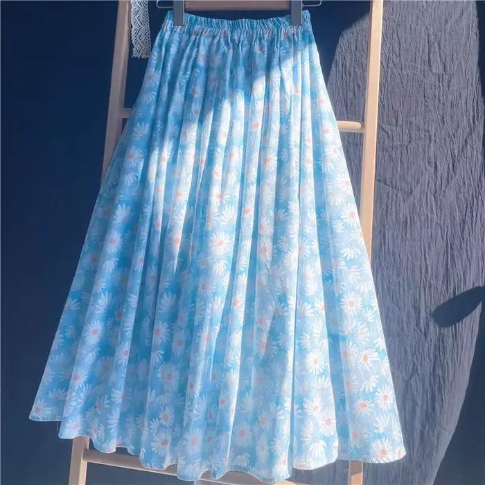 Jupe florale bleu clair pour femme, coupe trapèze mi-longue en mousseline, idéale printemps-été