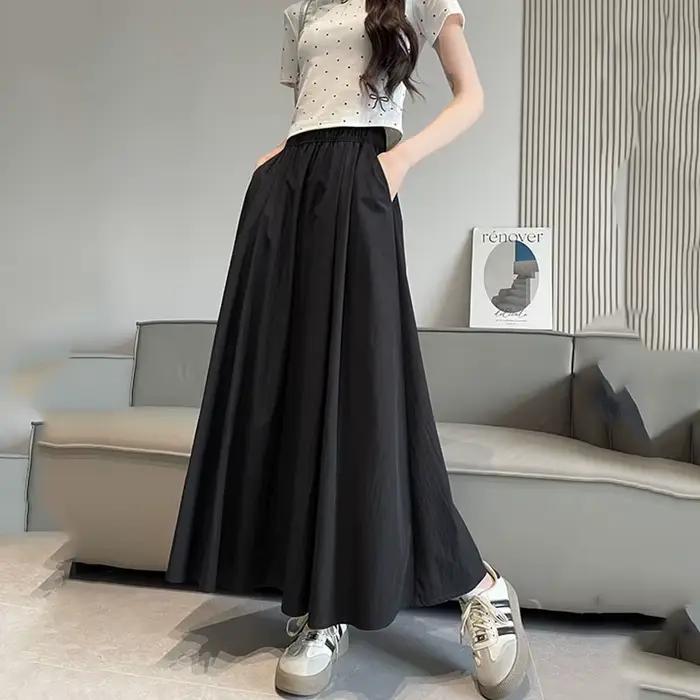 Jupe longue pour femme été 2026 décontractée taille haute élastique coupe trapèze couleur unie polyvalente ample avec