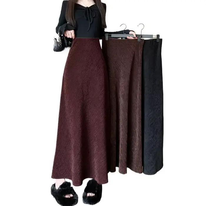 Demi-jupe trapèze noire taille haute, nouveau style 2025, jupe queue de poisson amincissante, jupe mi-longue d'automne et d'hiver