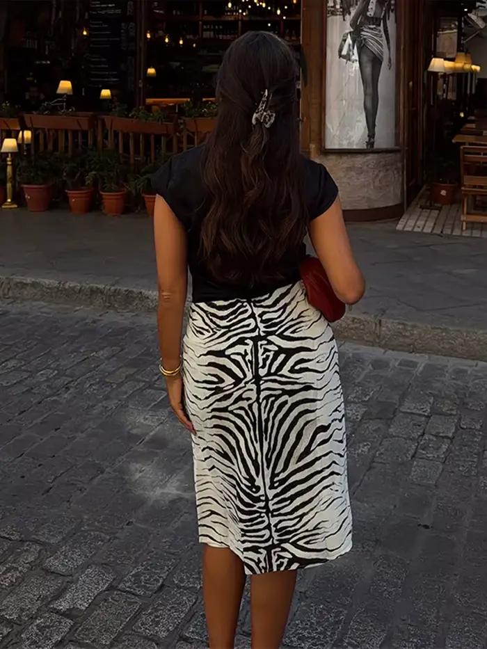 Jupe midi à taille haute à imprimé zèbre, devant plissé, coupe ajustée, été 2026, jupe chic mi-longue pour femme, jupe décontractée et chaleureuse.