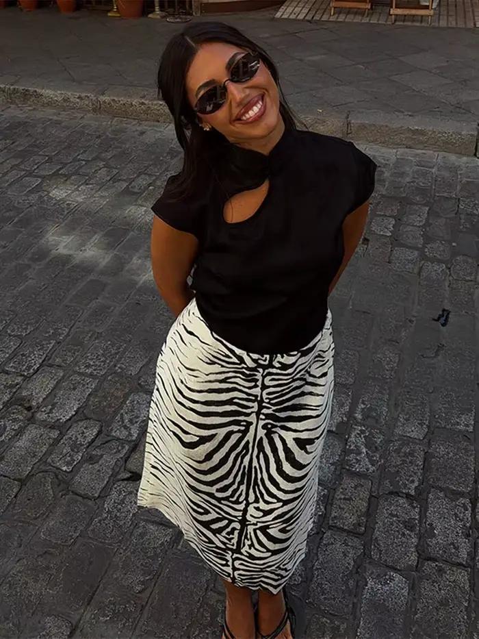 Jupe midi à taille haute à imprimé zèbre, devant plissé, coupe ajustée, été 2026, jupe chic mi-longue pour femme, jupe décontractée et chaleureuse.