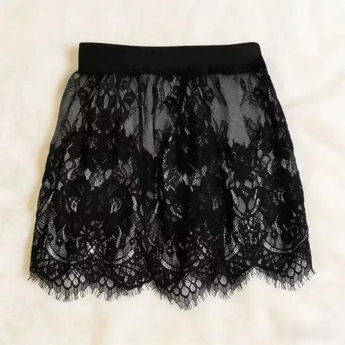 Mini-jupe sexy en dentelle transparente