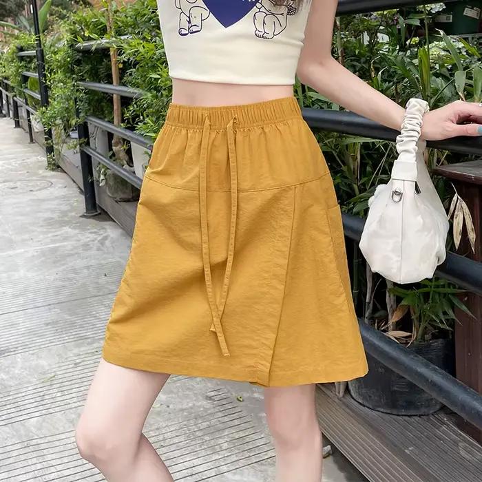 Faux 2 pièces Shorts jupes pour femmes taille haute Mini jupe blanche pantalon solide a-ligne fente latérale légère jupes d'été coréennes