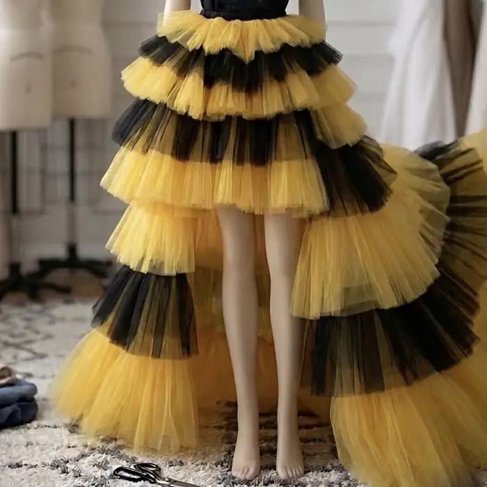 Jupe longue asymétrique à volants jaune et noir pour femme, taille élastique, à plusieurs niveaux, style maxi, couleur mixte