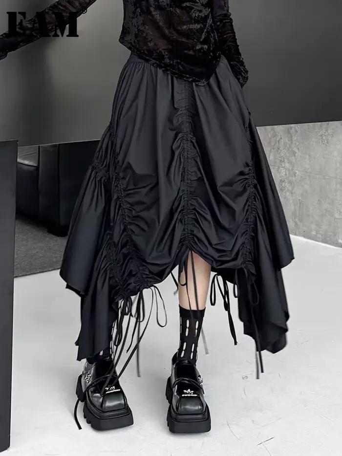 [EAM] taille haute élastique noir ourlet irrégulier cordon demi-corps jupe femmes mode marée nouveau printemps automne 2026 1DJ0643