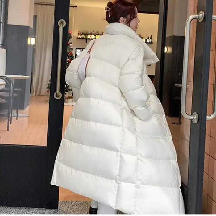 La longue veste coréenne rembourrée en coton est épaissie pour garder au chaud. Veste rembourrée en coton femme hiver en 2025