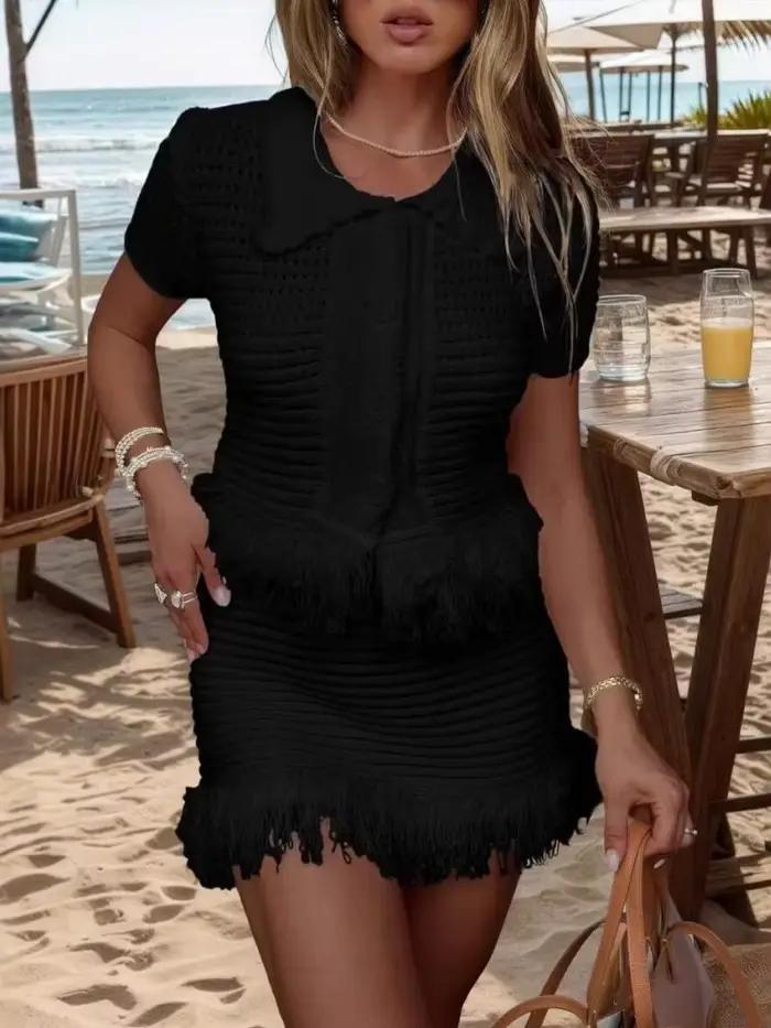 Ensemble élégant jupe courte et haut tricoté à manches courtes boutonné pour femme
