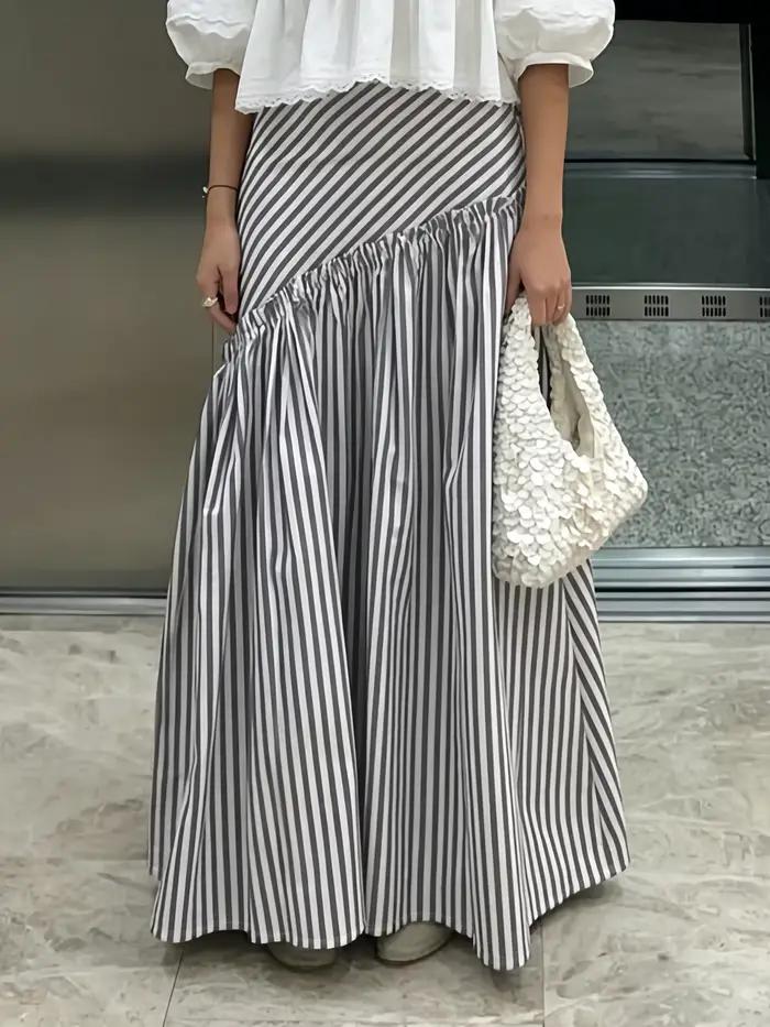 Jupe longue asymétrique à taille haute, plissée, à rayures vintage de style français. Design unique pour les trajets quotidiens, amincissant et flatteur, avec une élégance à la française, jupe longue 