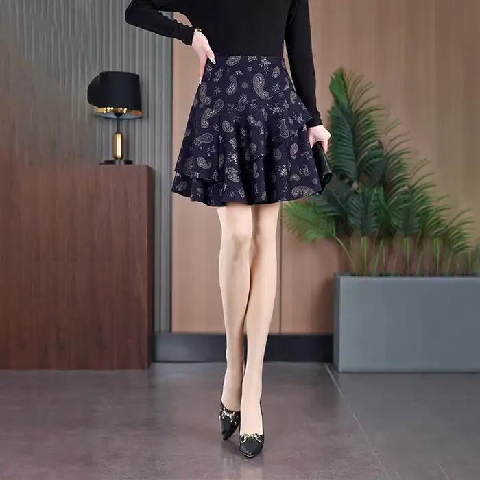 Mode imprimé épissé à volants a-ligne jupes vêtements pour femmes 2025 été nouveau bureau ample dame fermeture éclair
