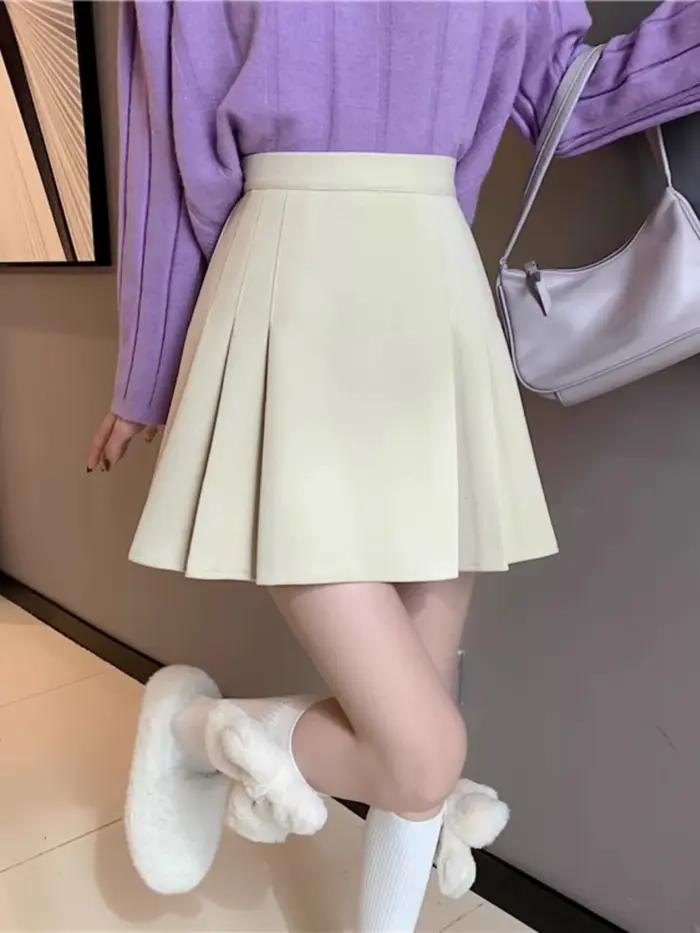 Jupe mini plissée noire élégante en polyester