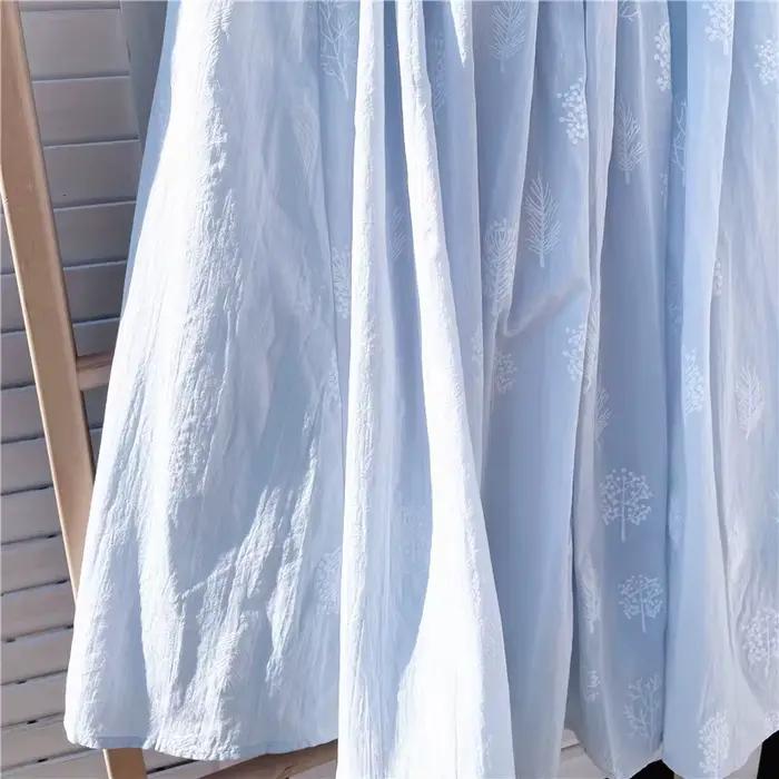 Jupe plissée mi-longue bleue en coton et lin