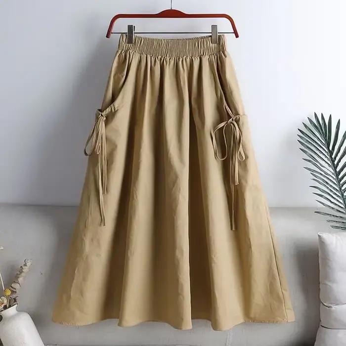 Jupe mi-longue élastique taille haute