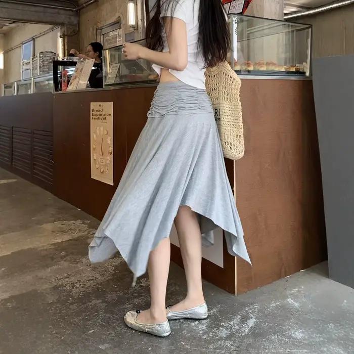 Jupe plissée asymétrique taille haute décontractée pour femme