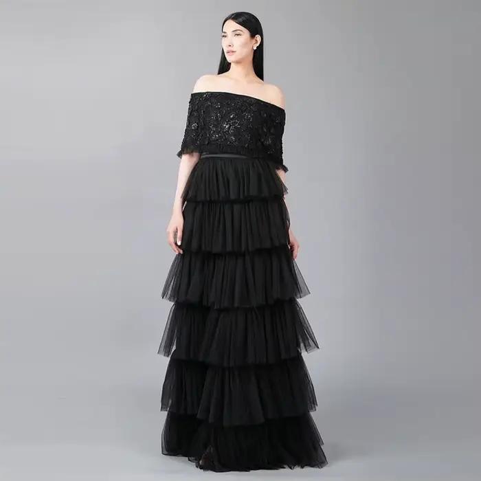 Jupes longues en tulle noir à volants