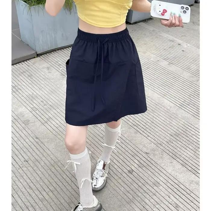 Faux 2 pièces Shorts jupes pour femmes taille haute Mini jupe blanche pantalon solide a-ligne fente latérale légère jupes d'été coréennes
