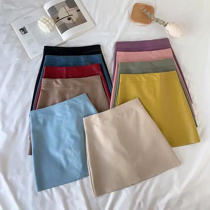 Mini jupe en cuir PU taille haute pour femme