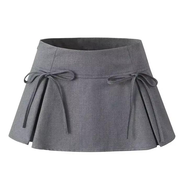 Mini-jupes avec nœud, jupe plissée ample