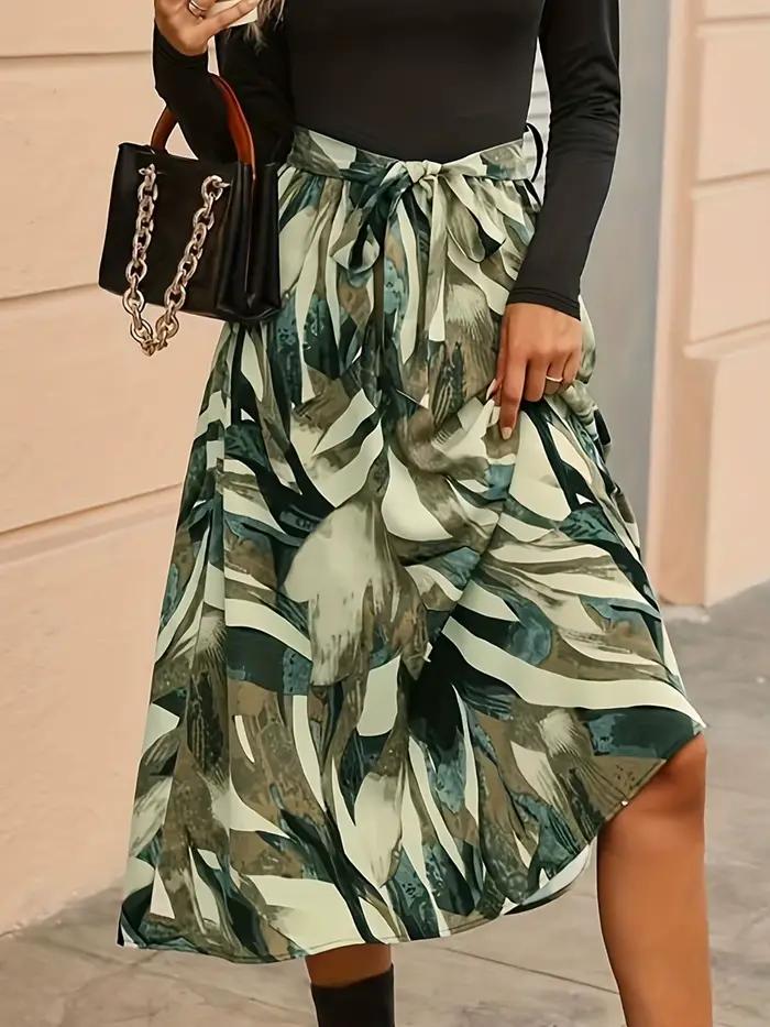 Jupe midi femme imprimé botanique vert taille haute avec nœud ourlet asymétrique coupe trapèze pour printemps occasions spéciales