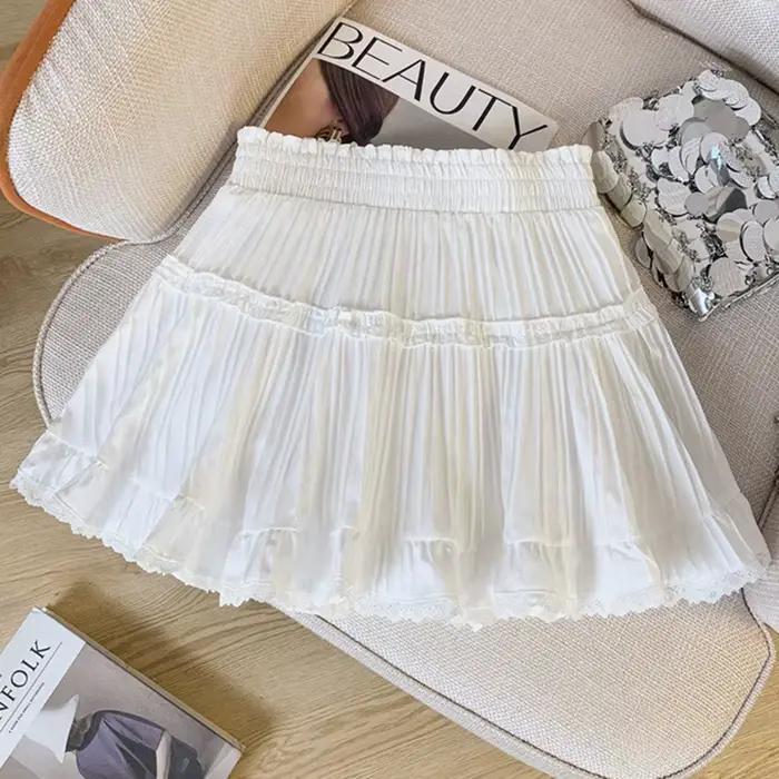 Mode coréenne taille élastique jupes plissées femmes été couleur unie dentelle Mini jupe femme douce une ligne Shorts