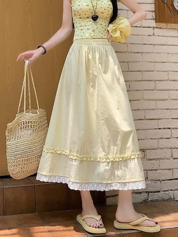 Jupe longue taille haute style coréen pour femme été 2026 jaune avec dentelle douce coupe parapluie élastique large pour toutes les occasions élégante à offrir
