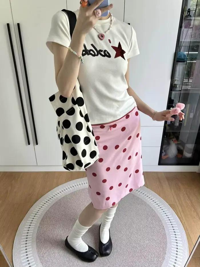 Jupe mi-longue tube droite à pois rose style rétro américain pour femme