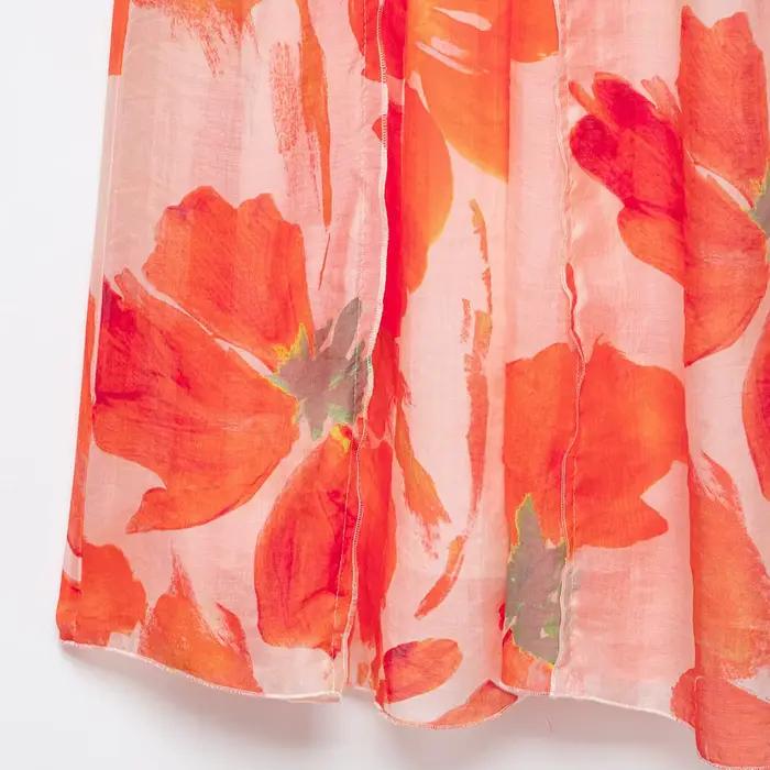 Jupe midi amincissante taille haute imprimée