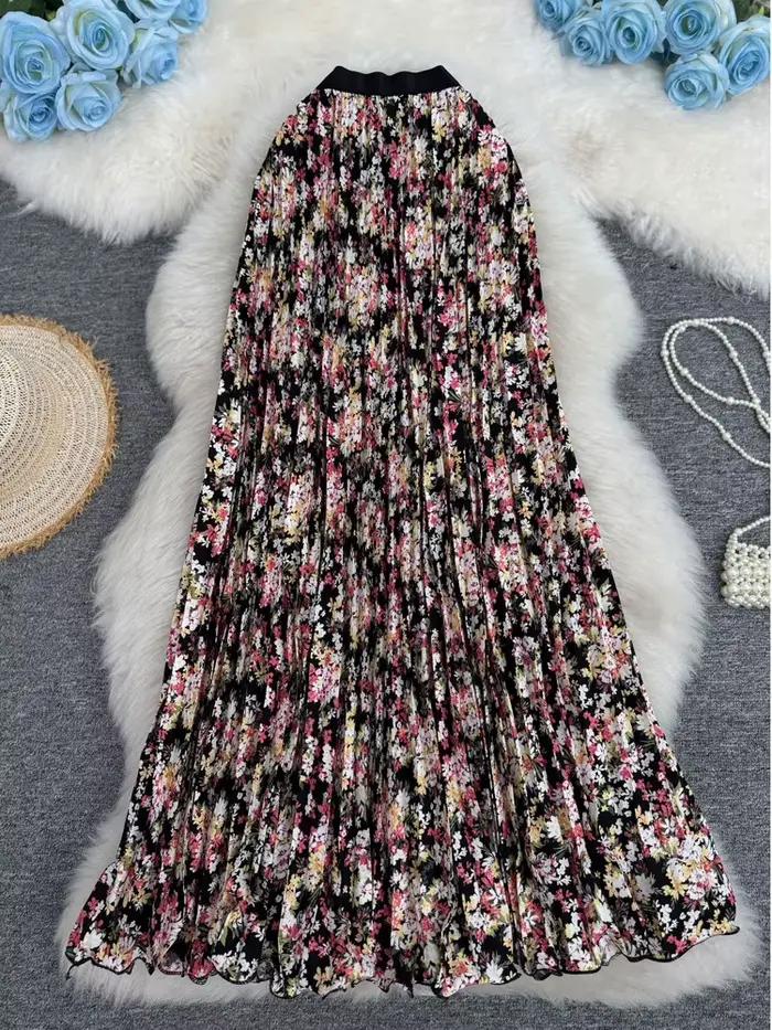 Nouvelle jupe plissée à imprimé floral pour femme, style vacances d'été 2026, élégante et polyvalente, jupe longue