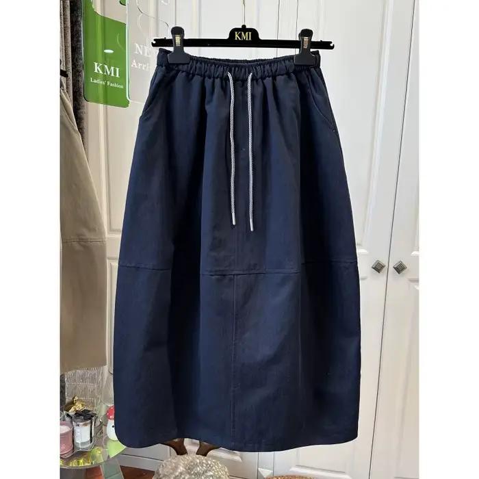 Jupe parapluie mi-longue élégante et polyvalente à taille élastique pour femme