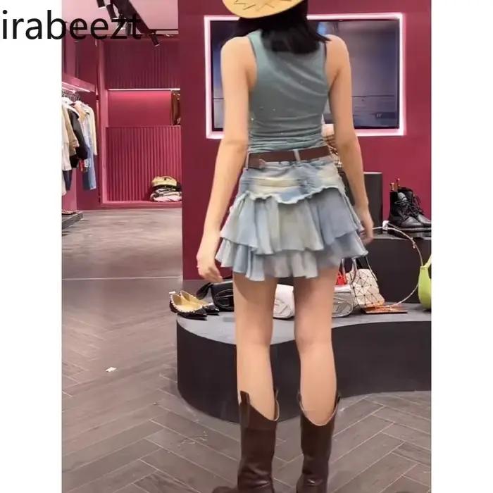 Dames jupes été nouveau personnalisé épicé fille épissé taille haute Denim a-ligne bord brut plissé jupe courte vêtements pour femmes