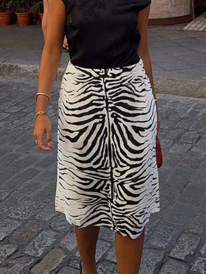 Jupe midi à taille haute à imprimé zèbre, devant plissé, coupe ajustée, été 2026, jupe chic mi-longue pour femme, jupe décontractée et chaleureuse.