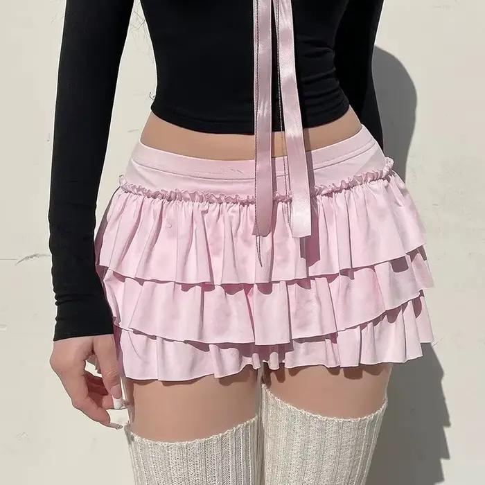 Mini jupes plissées à nœud rose pour femmes