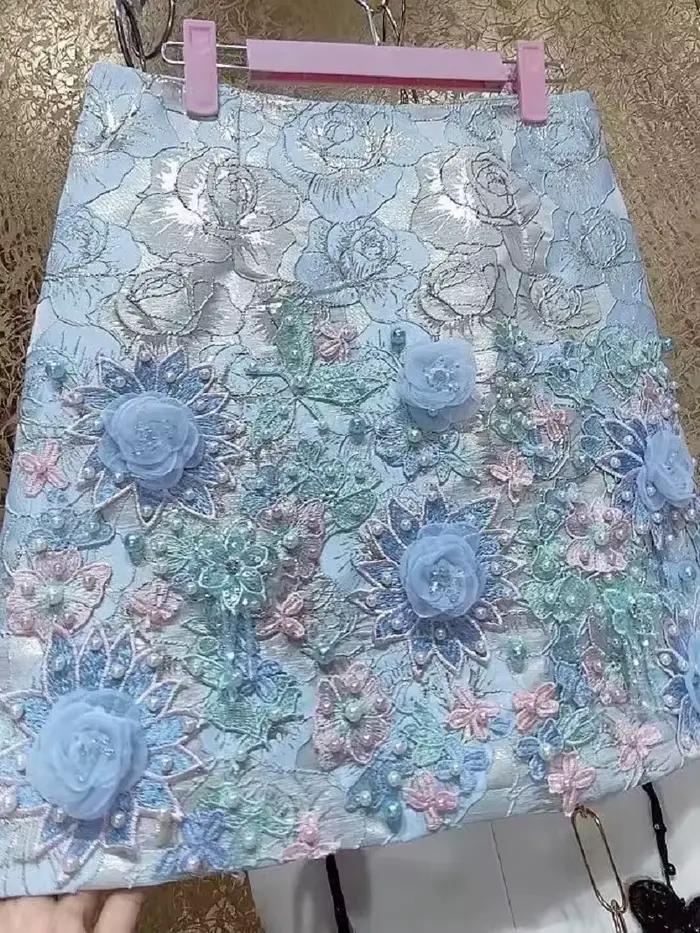 Design de luxe broderie fleurs 3D jupe courte perlée pour femmes pantalons courts jupes tendance mode Mini