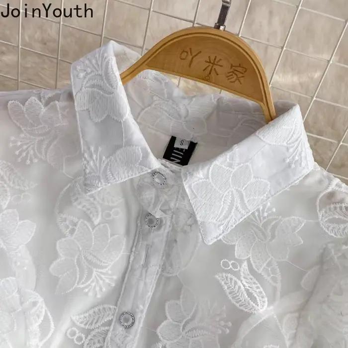 Robe d'été en dentelle blanche pour femmes, tunique de tempérament, manches bouffantes, broderie, à la mode, 2025